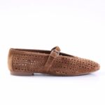 Brown suede perforated Mary Jane flat with an adjustable strap and buckle.