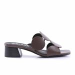 Brown open-toe sandal with circular disk straps and a short chunky black heel.