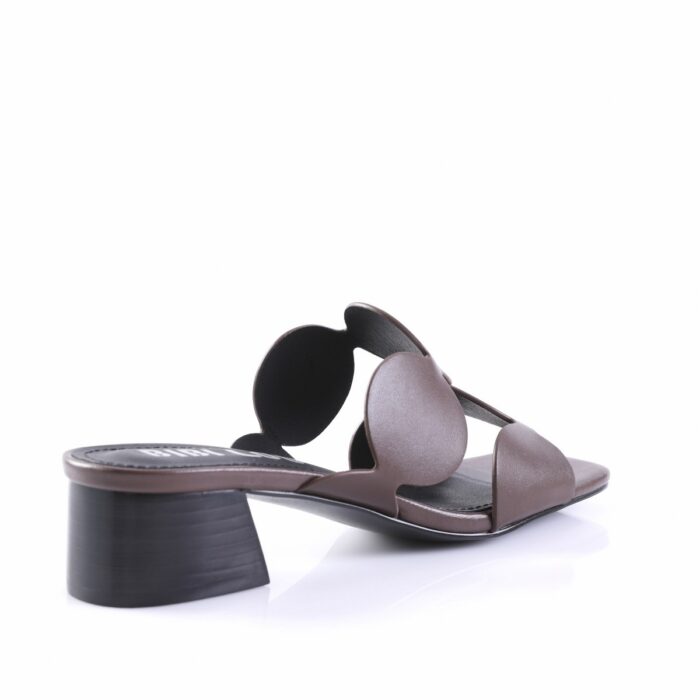 Brown open-toe sandal with sculpted circular side straps and a chunky black block heel, in a slip-on slide style