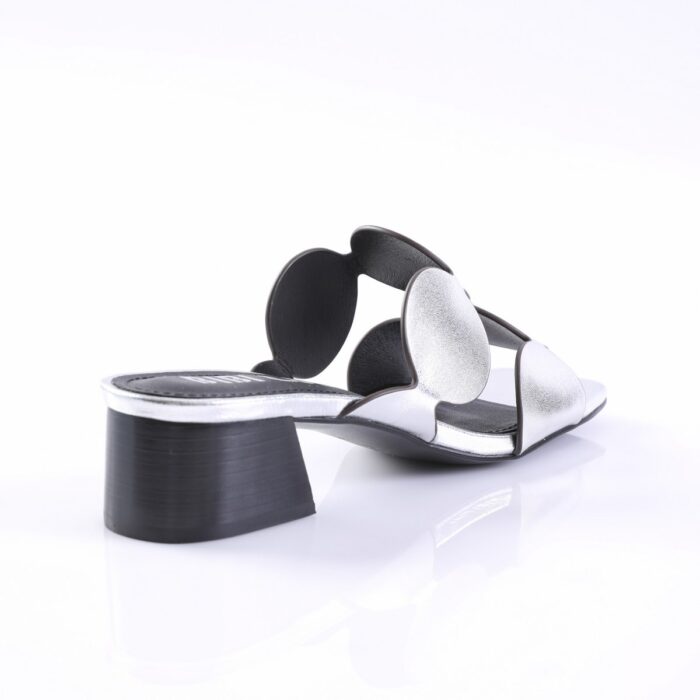 Silver metallic strappy sandal with a chunky black heel, shown on a white background from a side angle.