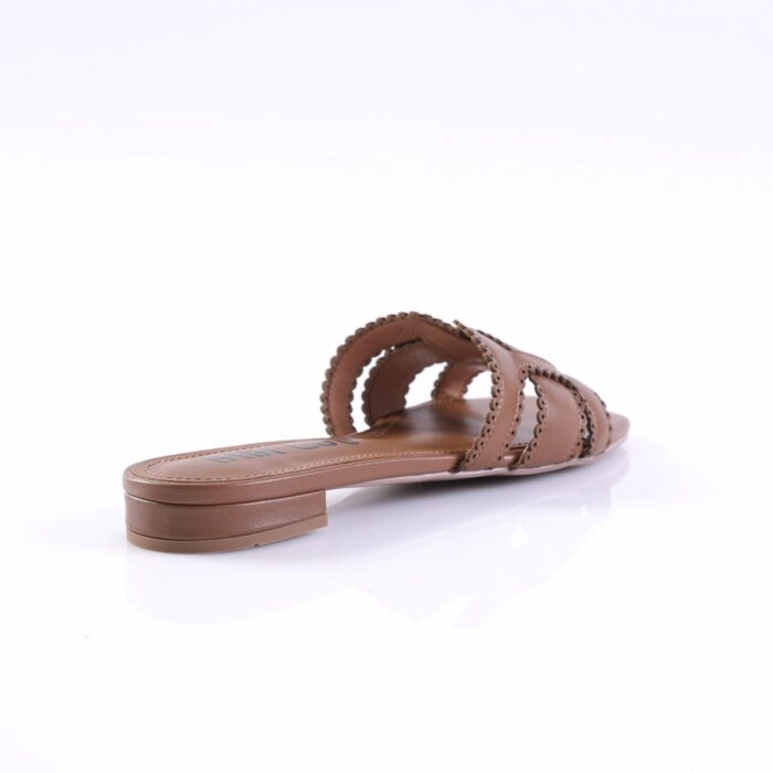 Brown flat slide sandal with braided strap detail on a white background (product photo)