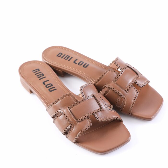 Brown leather slide sandals with scalloped perforated trim and low block heel; insole reads 'BIBI LOU'.