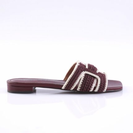 Maroon woven slide sandal with white trim and low heel on a white background, product photo