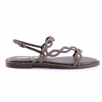 Brown flat sandal with glittery braided straps and ankle buckle.