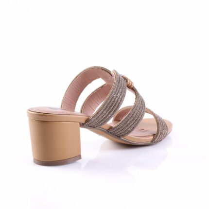 Beige heeled sandal with glittery, multi-strap upper and a chunky tan block heel.