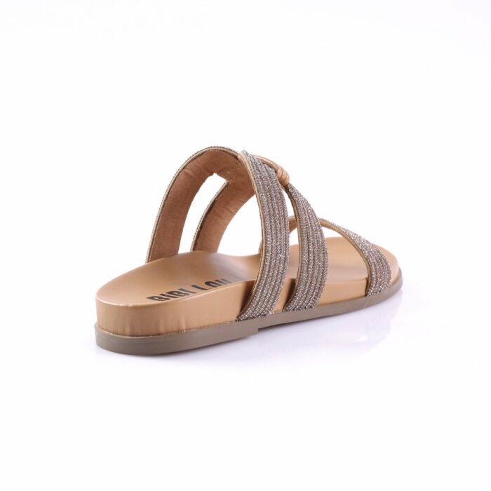 Beige flat sandal with two glittery straps across the foot and a tan sole (open-toe slide).