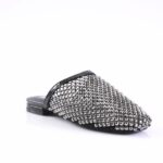 Black slip-on mule with a pointed toe, densely covered in silver rhinestones for a sparkly, dressy look. Low backless heel.