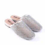 Silver rhinestone-covered slip-on sandals with a low stacked heel and beige footbeds marked BIBI LOU