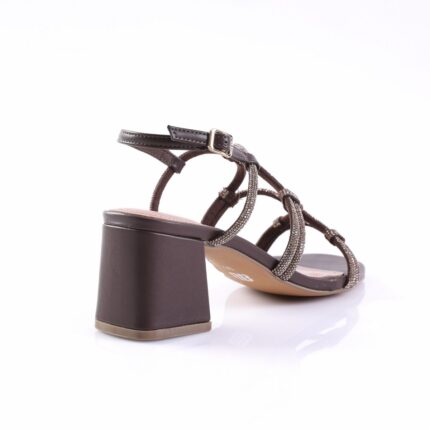 Brown strappy sandal with rhinestone-embellished straps, ankle buckle, and a chunky block heel viewed from the back side.