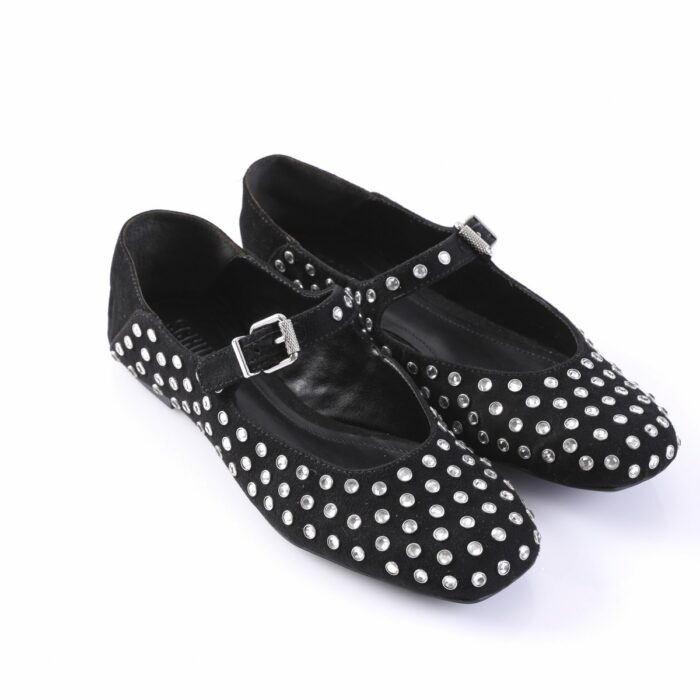 Black suede Mary Jane flats covered in silver studs with ankle straps and buckles.