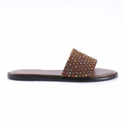 Brown leather slide sandal with a strap covered in multicolored studs and a black sole.