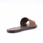 Brown slide sandal with studded, multicolored rhinestones on strap and a black sole.