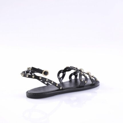 BlackFlat sandal with multiple studded straps and a gold buckle, open-toe design on a flat sole.