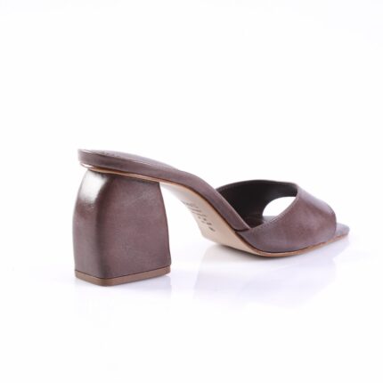 Brown leather mule sandal with an open toe and low block heel, viewed from the side