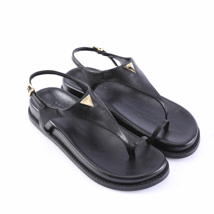 Black leather thong sandals with slingback strap and gold triangle logo plaques on the sides.