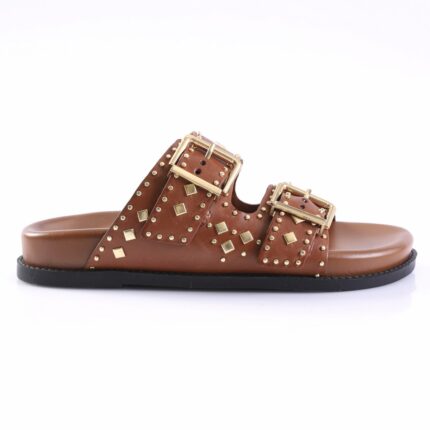 Brown leather slide sandal with two studded straps and gold buckles on a black sole