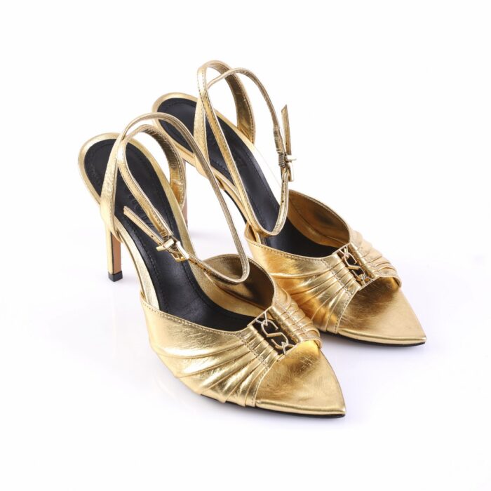 Gold metallic high-heeled sandals with crisscross straps and pointed toes on a white background, viewed from the side/angle.