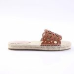 Brown cutout-strap espadrille flat sandal with a braided rope sole and stitched edge, side view