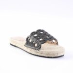 Black cut-out slide sandal with a rope-wrapped espadrille-style sole on a white background