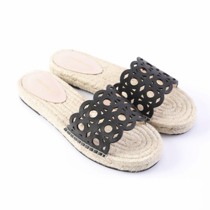 Beige espadrille slides with a black geometric cut-out strap on a braided jute sole