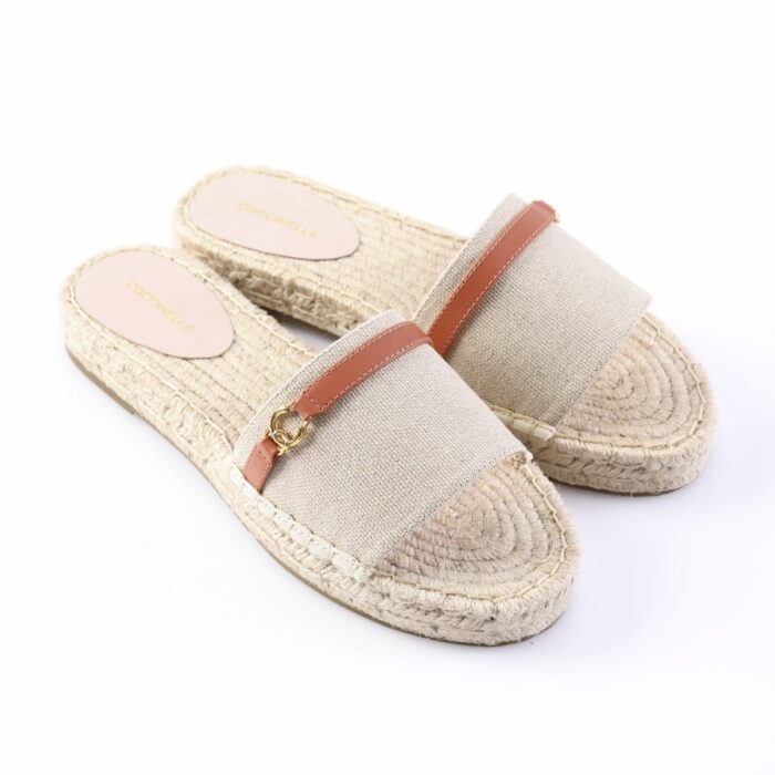 Beige espadrille slide sandals with woven jute sole and tan leather strap.