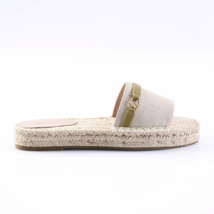 Beige espadrille slide sandal with a woven jute sole and beige fabric strap with gold hardware.