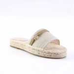 Beige fabric espadrille slide with braided jute sole and gold-accent strap.