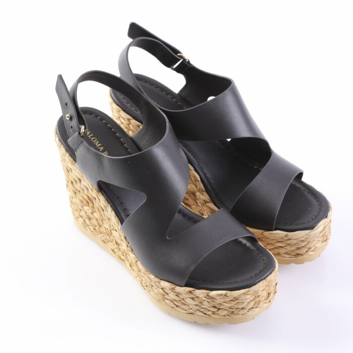 Black leather wedge sandals with braided jute sole and ankle strap closures.