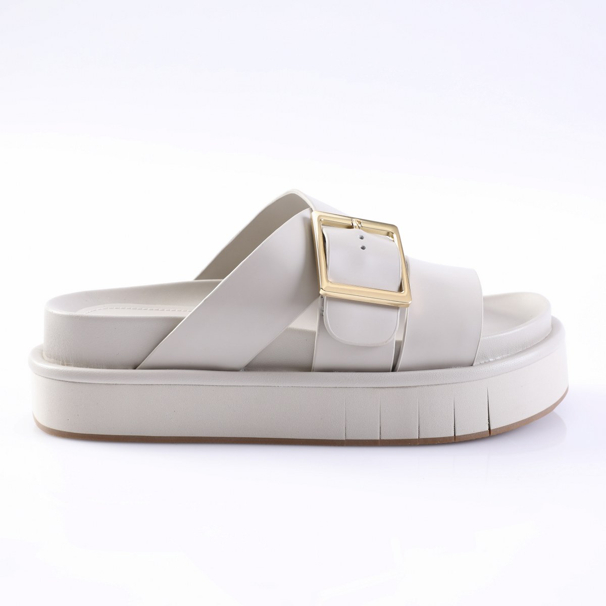 26PBDEMLG-1 White platform slide sandal with a wide strap and gold square buckle on a chunky sole.