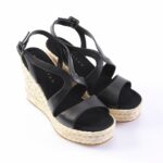 Black leather wedge sandals with braided espadrille heel and ankle strap Buckle.
