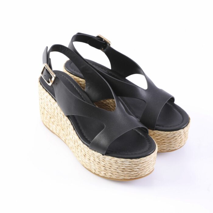 Black wedge sandals with braided espadrille platform and gold buckle.