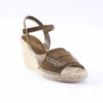 Brown suede espadrille wedge sandal with ankle strap and decorative stitching along the toe.