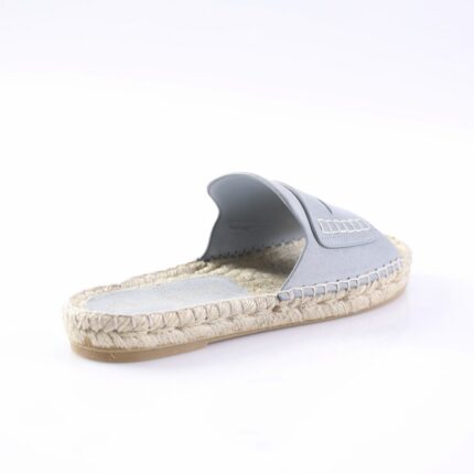 Light blue espadrille slide with a rope-wrapped sole and single wide strap.