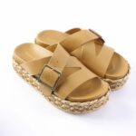 Tan leather platform sandals with wide crisscross straps and braided jute sole