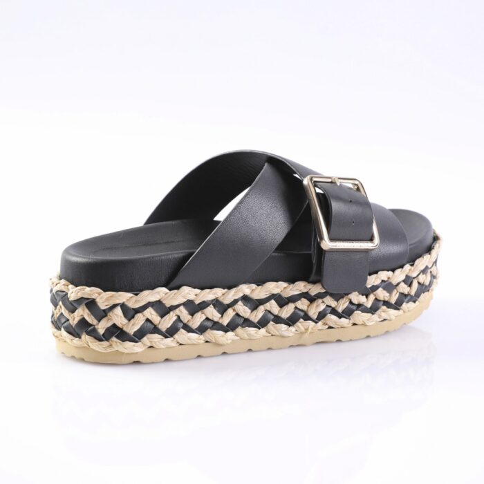 Black leather sandal with two crossing straps, a gold buckle, and a braided jute espadrille sole