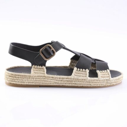 Black leather sandal with adjustable ankle strap and a beige woven espadrille-style sole.