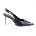 Black slingback high-heeled pump with a pointed toe and gold buckle detail.