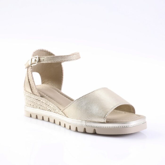 Gold metallic open-toe sandal with adjustable ankle strap and braided-espadrille wedge.
