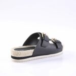 Black two-strap slide sandal with gold buckles and a rope-wrapped espadrille-style sole on a white background.