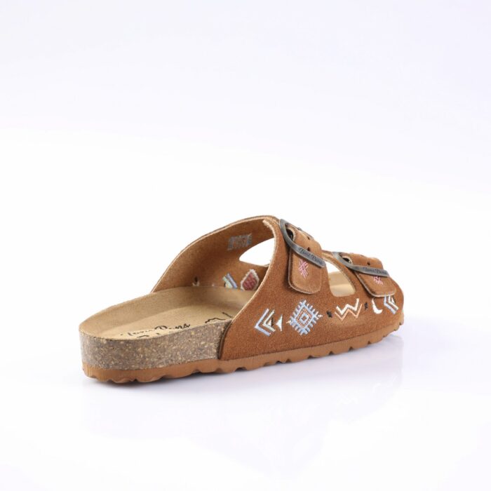 Brown suede sandal with two adjustable Velcro straps and geometric embroidery on the straps and sides, cork-like footbed. Detectable for product listing purposes.