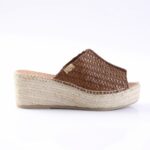 Brown woven leather wedge sandal with a jute-stitched platform, shown from the side.