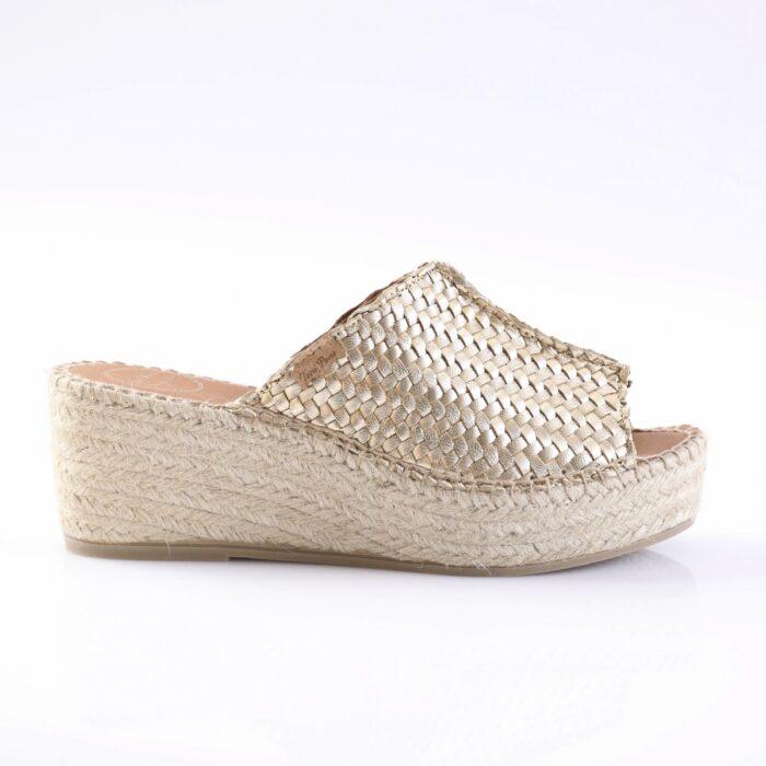 Gold metallic woven espadrille wedge sandal with a jute sole on a white background.