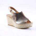 Metallic bronze wedge espadrille sandal with ankle strap and woven jute sole.