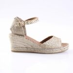 Gold-toned woven espadrille wedge sandal with ankle strap and buckle
